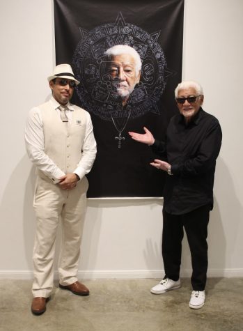 Rony Armas with one of the subjects of his art show