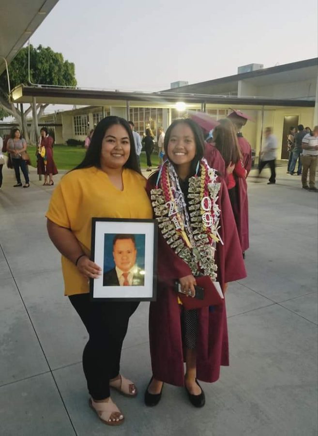 Photo of me, my aunt and framed photo of my dad (Alyson Chan) 