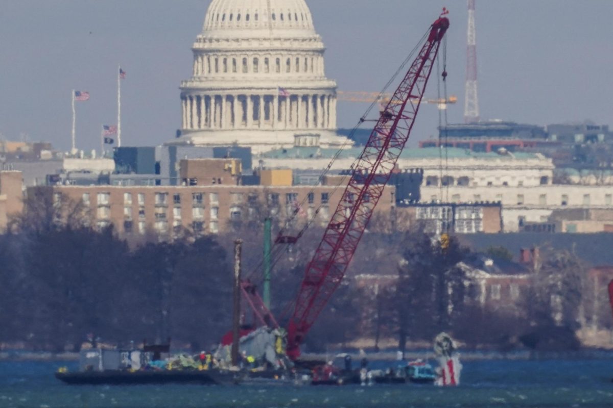 Crews work to retrieve the wreckage of American Eagle flight 5342 in the Potomac River, in the aftermath of the collision of American Eagle flight 5342 and a Black Hawk helicopter that crashed into the river. February 4, 2025. Photo by Nathan Howard