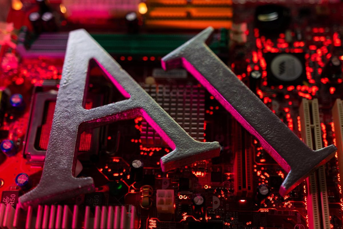AI (Artificial Intelligence) letters are placed on computer motherboard in this illustration taken, June 23, 2023. REUTERS/Dado Ruvic/Illustration