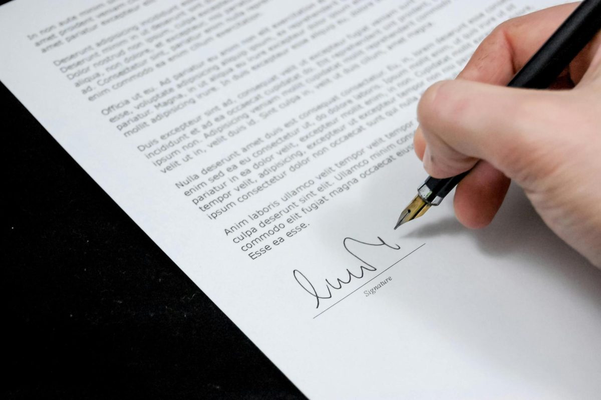 Photo by Pixabay: https://www.pexels.com/photo/person-signing-in-documentation-paper-48148/